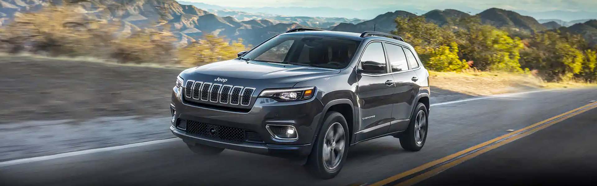 Jeep Cherokee driving on highway
