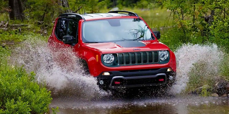 Dan Cummins Chrysler Dodge Jeep Ram Georgetown in Georgetown KY Jeep Renegade driving through a stream