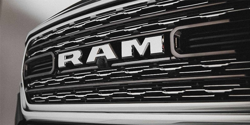 Close up view of the RAM logo on a RAM 1500