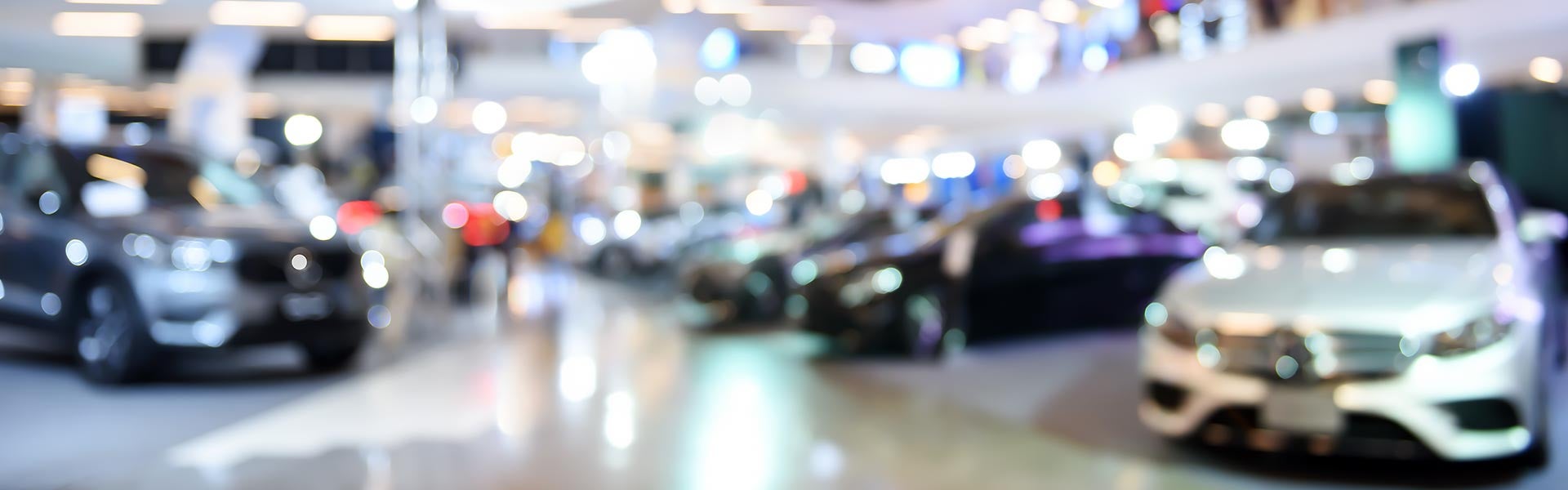 Out of focus photo of car showroom floor
